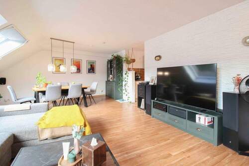 01 Wohnzimmer - Helle 3 Zimmer Eigentumswohnung in Schloß Neuhaus, Effizienz B, Einbauküche u. TG-Stellplatz inkl.