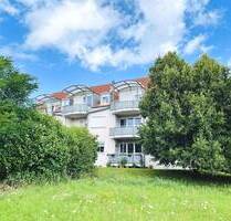 Komfortwohnung im sonnigen Grün... sofort beziehbare 3 Zimmer-Eigentumswohnung mit Balkon und Kfz-Stellplatz, Wohnfl. 73m² - Haßfurt Augsfeld
