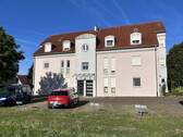 Ostansicht mit Hauszugang - 3 Zimmer Etagenwohnung zum Kaufen in Haßfurt