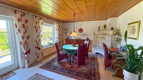 Essbereich mit Kachelofen - 3 Zimmer Bungalow in Handewitt