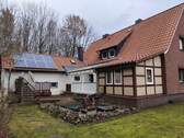Hausansicht - Einfamilienhaus mit zusätzl. Wohneinheit, Terrasse und Nebengebäude 49419 Wagenfeld, Niedersachsen