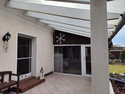 Terasse mit Wintergarten - Einfamilienhaus mit 167,00 m&sup2; in Wagenfeld zum Kaufen