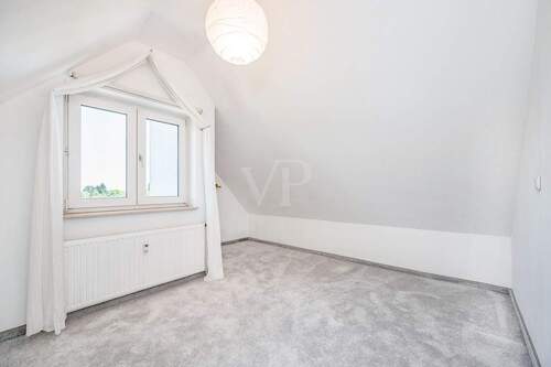 Schlafzimmer zwei im Dachgeschoss - 