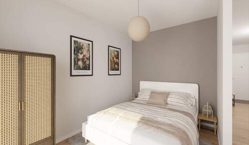 Ein gemütlicher Schlafbereich mit Blick zum Balkon - 1 Zimmer Etagenwohnung in Germersheim