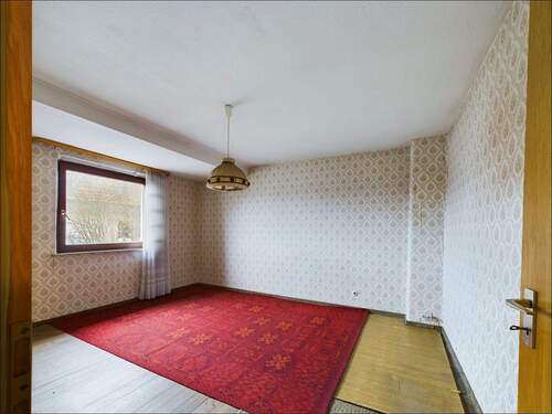Schlafzimmer (Haus 1) - 