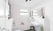 Modernes Badezimmer mit Badewanne und bodengleicher Dusche - 
