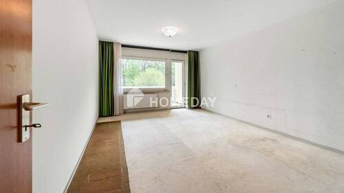 Schlafzimmer 1 - Zwei-Zimmer-Wohnung für Eigennutzer in Hürth mit Loggia und Grünblick