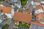 Aufnahme aus der Vogelperspektive - Einfamilienhaus mit 123,00 m² in Lollar zum Kaufen