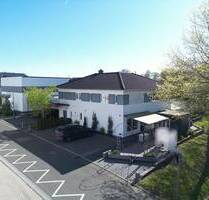 Grenzenlose Möglichkeiten: Ihr modernes Wohn- und Geschäftshaus mit Halle und Top-Effizienz in Gudensberg!
