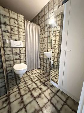 WC mit Waschmaschine - 