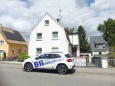 Immer gerne für Sie da_ - Charmante Familienoase als Einfamilienhaus mit Garage in guter Lage mit viel Platz direkt in Mengen.