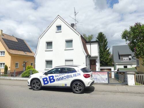 Immer gerne für Sie da_ - Charmante Familienoase als Einfamilienhaus mit Garage in guter Lage mit viel Platz direkt in Mengen.
