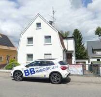 Charmante Familienoase als Einfamilienhaus mit Garage in guter Lage mit viel Platz direkt in Mengen.