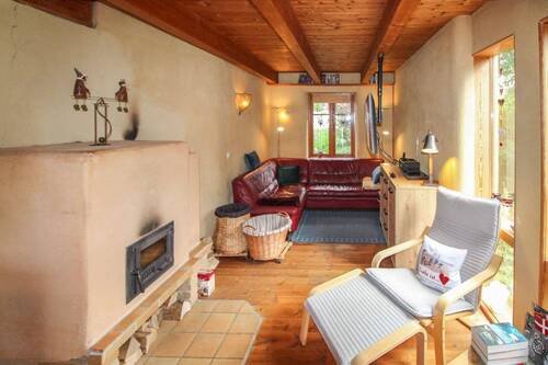 Wohnzimmer mit Kamin - Einfamilienhaus mit 121,00 m² in Böel zum Kaufen