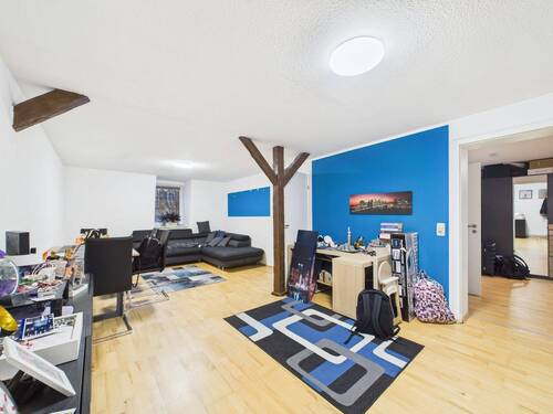 Wohnzimmer - Attraktive Dachgeschosswohnung in Lübeck St.-Jürgen - ideal für Singles!