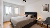 Schlafzimmer - Moderne 2-Zimmer-Wohnung mit Balkon in zentraler Lage von Reutlingen