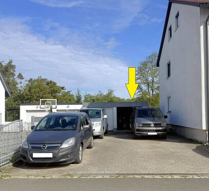 Garage u. Stellplatz - 