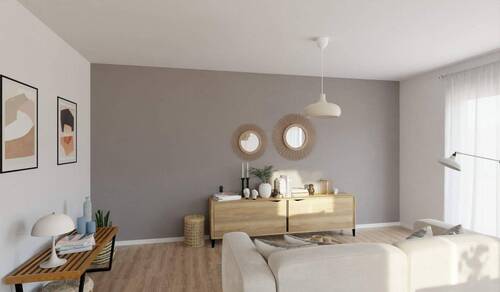 Lichtdurchfluteter Wohnbereich dank bodentiefer Fenster - 