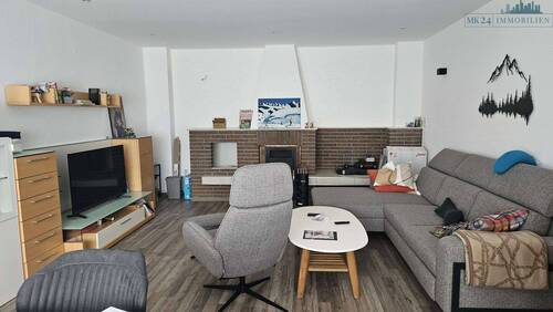 Wohnzimmer mit Kamin - 