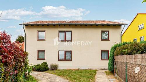 Außenansicht 1 - Attraktives Zweifamilienhaus mit 8 Zimmern, EBK und Garage in ruhiger Lage von Nürnberg