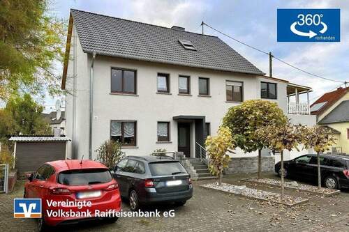 Immobilienangebot in Minderlittgen - Dreifamilienhaus mit zusätzlichem Neubaupotenzial - Investieren mit Perspektive!