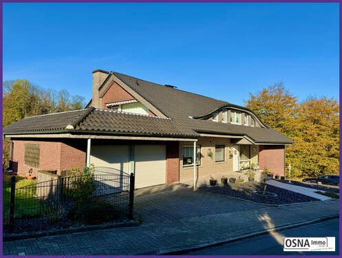 Seitenansicht Garage links - 1 Zimmer Mehrfamilienhaus, Wohnhaus zum Kaufen in Georgsmarienhütte