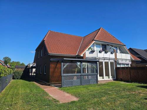  Rückansicht.jpg - Schöne 3 Zimmer-Erdgeschosswohnung mit Terrasse und Garten