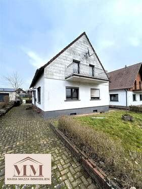 Front - Sofort frei!! Freistehendes Einfamilienhaus mit Garten und Garage zu verkaufen