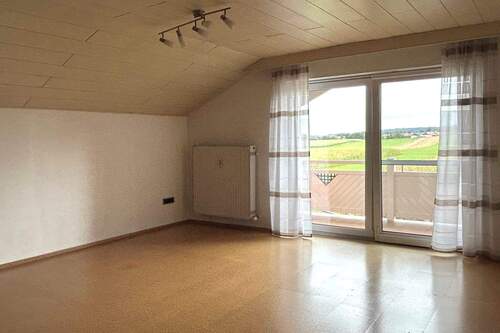 Schlafzimmer mit Balkon im OG - 