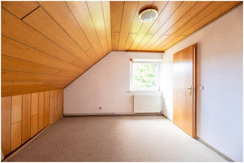 Schlafzimmer Nr. 2 im Dachgeschoss - 