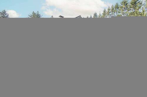 Seitenansicht Süd-West - Beispielloses Wohnerlebnis in Norddeutschland! Barrierearmes Traumhaus mit Lift in idyllischer Lage