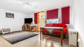 Wohnzimmer 1 - Attraktive 1-Zimmer-Wohnung mit Loggia in Nürnberg Stein