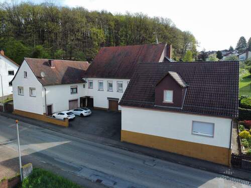Frontansicht - 1 Zimmer Mehrfamilienhaus, Wohnhaus zum Kaufen in Kottweiler-Schwanden