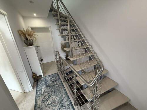  EG Treppenhaus - Reihenmittelhaus mit 95,00 m² in Herten zum Kaufen