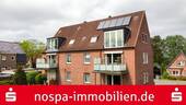 Drohnenbild - Attraktives Investment: Voll vermietetes Mehrfamilienhaus mit großem Grundstück in Breitenburg