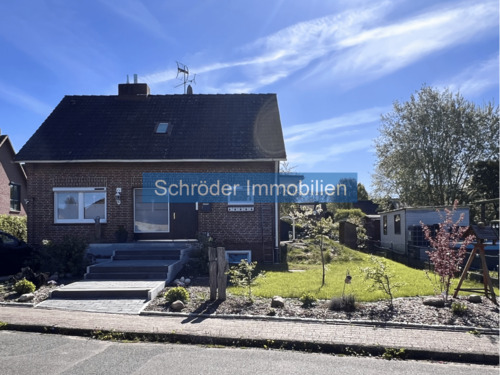 Titelbild mit Wasserzeichen - Freistehendes Einfamilienhaus - modernisiert und familienfreundlich