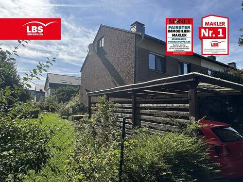 Hausansicht mit Gartenblick - Familienidyll in Drevenack - REH mit Garage, Carport und Garten!