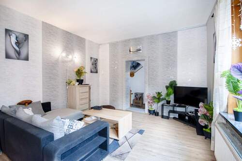 Wohnzimmer - 5 Zimmer Einfamilienhaus zum Kaufen in Todenbüttel