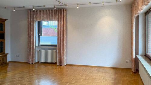 Wohnzimmer - Einfamilienhaus mit 107,00 m² in Neuenhaus zum Kaufen