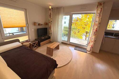 Wohn- und Schlafbereich - 1 Zimmer Etagenwohnung in München
