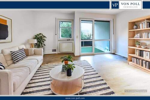  Wohnzimmer - Anprechende Zwei-Zimmer Wohnung mit idyllischer Loggia und Tiefgaragenstellplatz