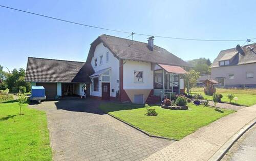 Bild 2 - 8 Zimmer Einfamilienhaus zum Kaufen in Biebern
