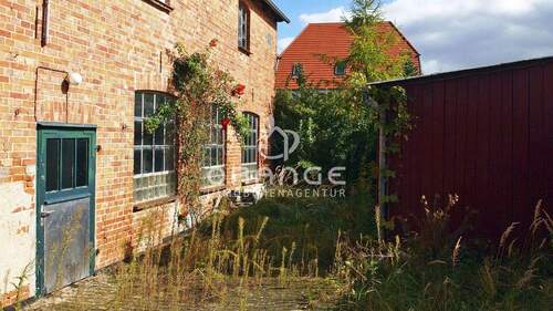 Innenhof mit Zugang zum verwunschenen Garten - 