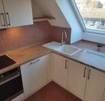 2-Zimmer-Wohnung mit Dachterrasse, EBK, saniertem Bad und TG im beliebten Österreichviertel - Monheim am Rhein Baumberg