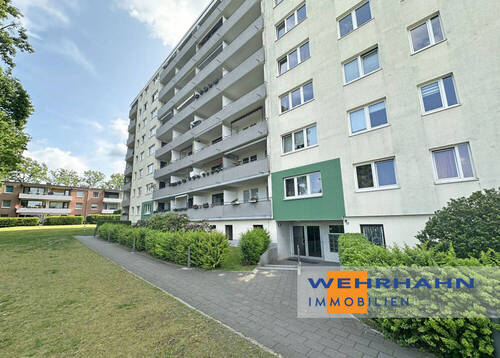 Titelbild mit Branding - Charmante 2,5-Zimmer-Wohnung mit sonniger Loggia ideal für Singles oder Paare