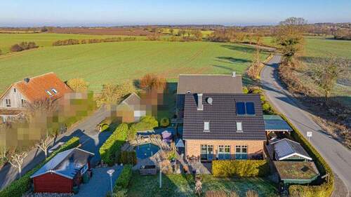 Seitenansicht - 4 Zimmer Einfamilienhaus zum Kaufen in Giekau