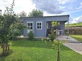 Gartenhaus mit überdachtem Grillplatz. - 
