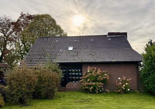 Straßenansicht Nordansicht - Einfamilienhaus mit 129,00 m² in Jever zum Kaufen