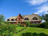 Hollandwarft in der Sonne - Ferienhaus mit vier individuell gestalteten Wohnungen