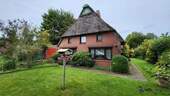 Haus von vorne.jpg - 4 Zimmer Einfamilienhaus in Krempermoor